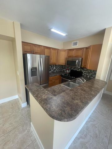 Lakeworth Condo: 7233 Golf Colony Court E 102, Lake Worth, FL 33467