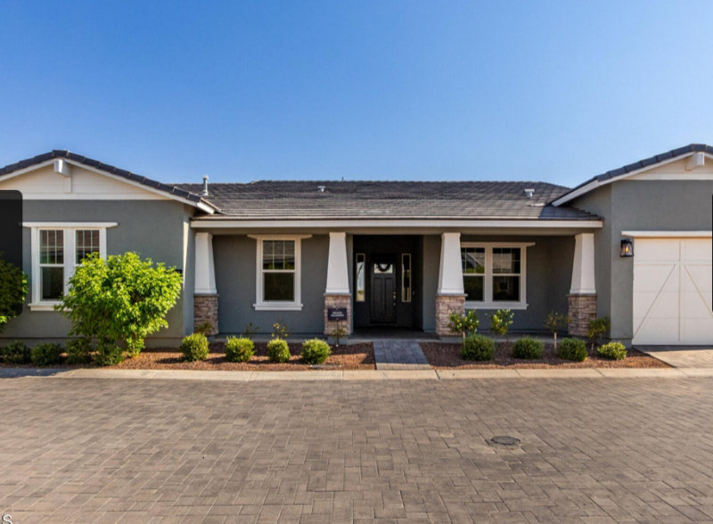 Surprise House: 17233 W Dartmouth St